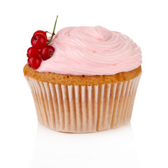 Tasty muffin with berries isolated on white
