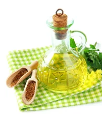 Fotobehang Jar of mustard oil and seeds with mustard flower © Africa Studio