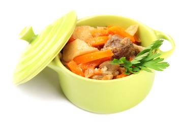 Homemade beef stir fry with vegetables in color pan, isolated