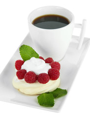 Tasty meringue cake with berries and cup of coffee, isolated