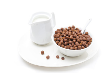 chocolate flakes and a jug of milk for breakfast, isolated