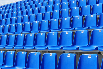 A row of blue seats