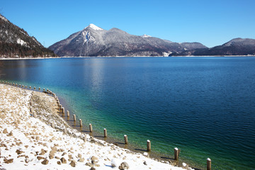 An image of the Walchensee in Bavaria Germany covered in snow