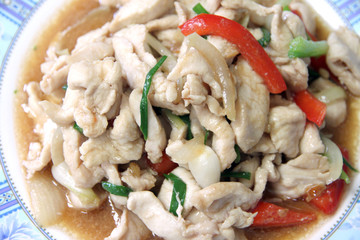 Fried chicken with bell peppers.