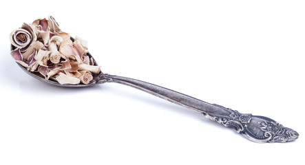 Dried lemon grass in silver spoon