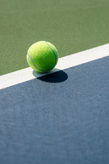 Image of a Tennis Ball on the line