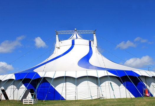 Blue Circus Tent In Green Field