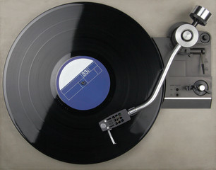 Closeup of vintage turntable with phonorecord
