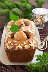 Chocolate cake with pears and chocolate sauce.