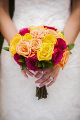 Bride Holding Multi Colored Bouquet