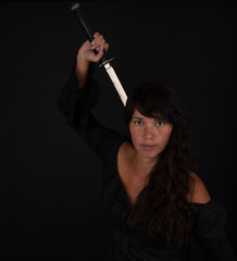 Obraz premium Asian woman grabbing her sword
