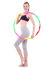 Woman doing exercises with hula hoop