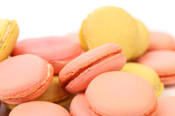 Background of several various macaron cakes.