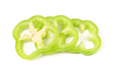 slices of green bell pepper isolated