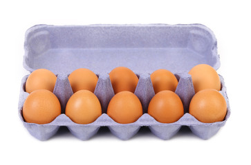 The brown eggs in egg box