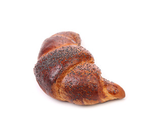 Appetizing croissant with poppy.