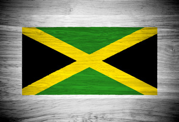 Jamaica flag on wood texture