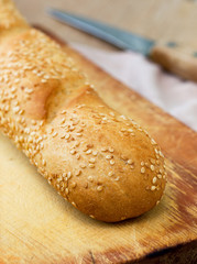Naklejka premium Baguette with sesame seeds