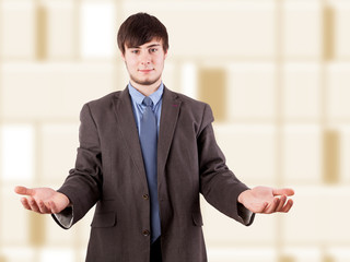 Young businessman with open hands
