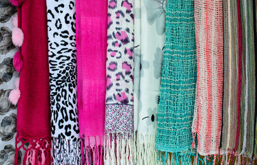 Fototapeta na wymiar The collection of beautiful colorful scarves