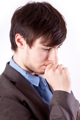 Young businessman in thinking