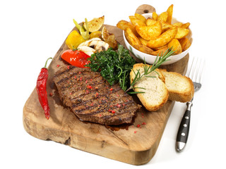 Steak mit Kartoffelecken und Gemüse