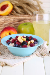 Oatmeal in plate with berries