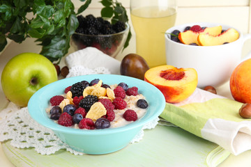 Oatmeal in plate with berries