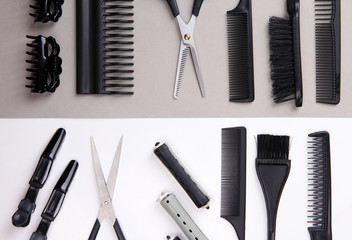 Professional hairdresser tools on white and gray background