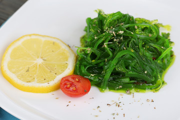 Sea kale on plate close-up