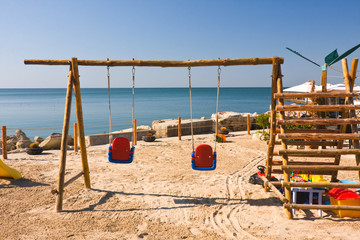 swings on the beach