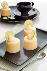 Delicious homemade japanese cheesecake and cup of tea.