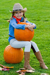 Pumpkins, Halloween - girl and large pumpkins.