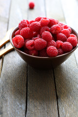 juicy fresh raspberries in a bowl