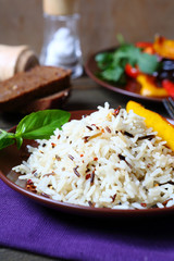 Boiled white and wild rice on a plate