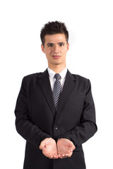 Young business man holding hand presenting a product