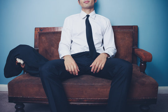 Businessman relaxing after long day at work