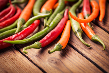 hot peppers on the wooden table