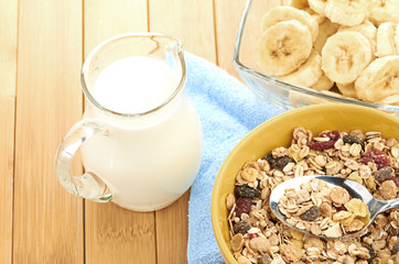 Delicious and healthy cereal in bowl with milk