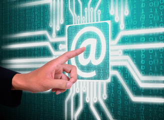 LCD circuit email address on blue screen background with finger