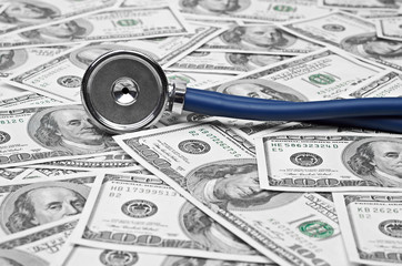 heap of dollars with stethoscope