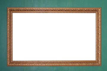 Isolated wooden frame on a green wall