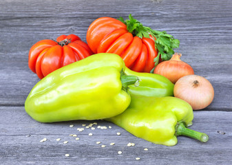 Fresh sweet green peppers with onion and tomatoes