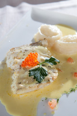 Grilled Salmon with saffron sauce.