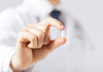 doctor with pill in hospital