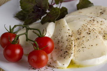 mozzarella tomato basil and oil