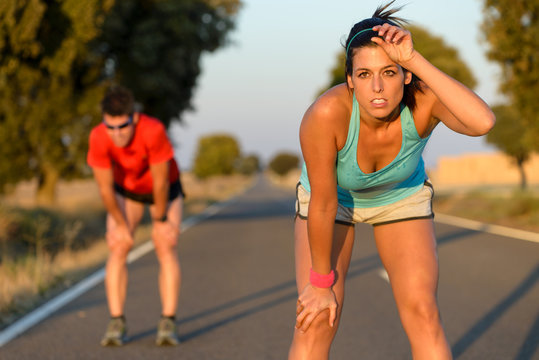 Tired Athletes After Running Hard