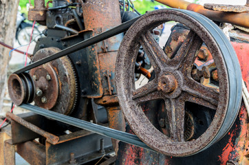 Old pulley and belt of the lawnmower