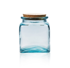 Empty glass jar with cork stopper isolated on white.