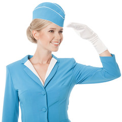 Charming Stewardess Dressed In Blue Uniform On White Background